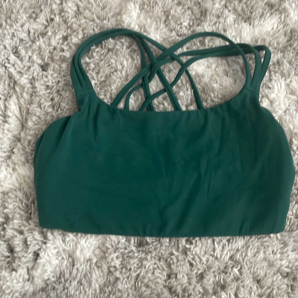 Deep green XS athleta sports bra worn maybe twice.